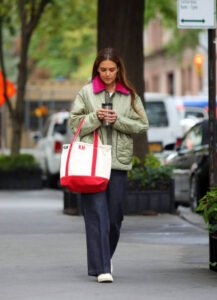 NEW YORK, NEW YORK - SEPTEMBER 23: Katie Holmes carries a Lands' End canvas tote bag during a walk in uptown Manhattan on September 23, 2024 in New York City. (Photo by Sara Jaye/WireImage)